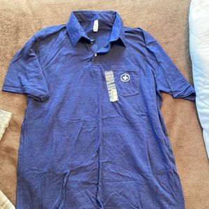 Men’s polo shirt. Size xl. NWT fleur de lis on pocket. Soft fabric